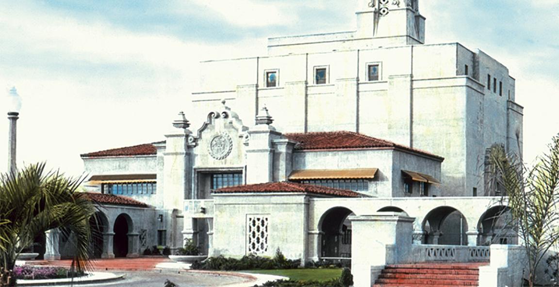 Hand-colored lantern slide of the Softening and Filtration Plant administration building. February 18, 1944.